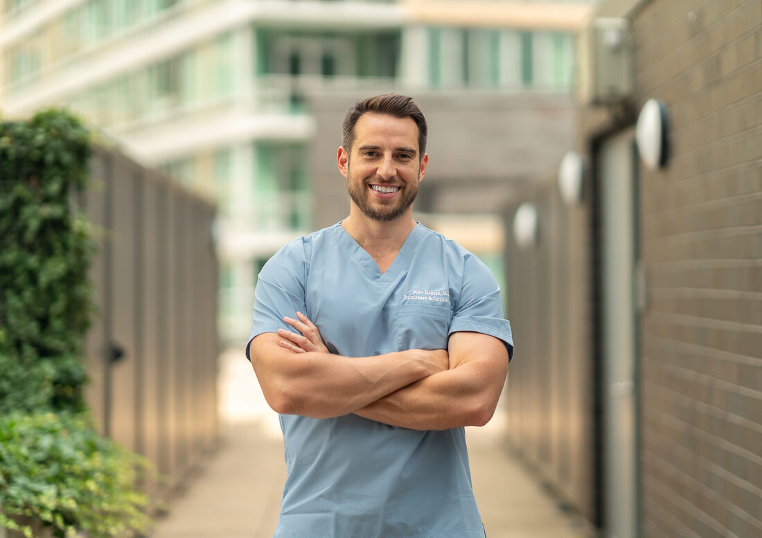 Michael Hansen, MD, in scrubs